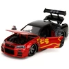 Kép 2/8 - Godzilla 2002 Nissan Skyline GT-R (R34) piros/fekete modellautó 1:24