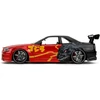 Kép 7/8 - Godzilla 2002 Nissan Skyline GT-R (R34) piros/fekete modellautó 1:24